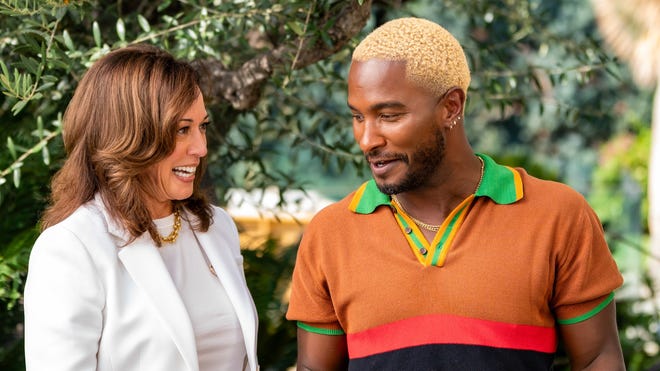 Red Carpet Host Charms VP Harris