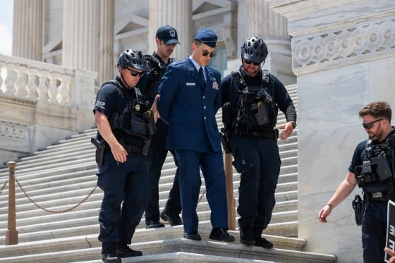 Air Force Officer Arrested After Capitol Impeachment Call
